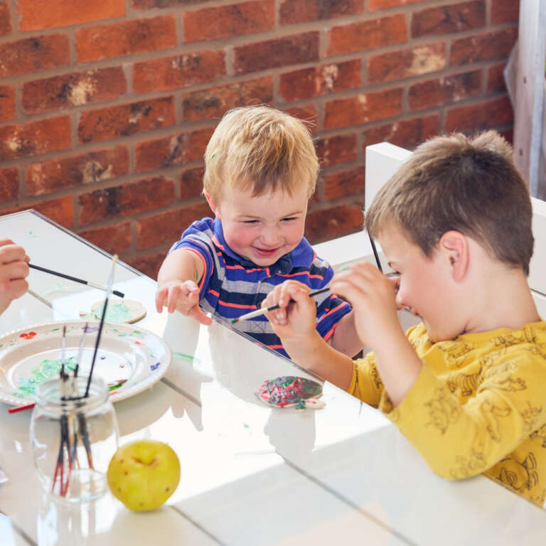 Family apple painting activity at newton court