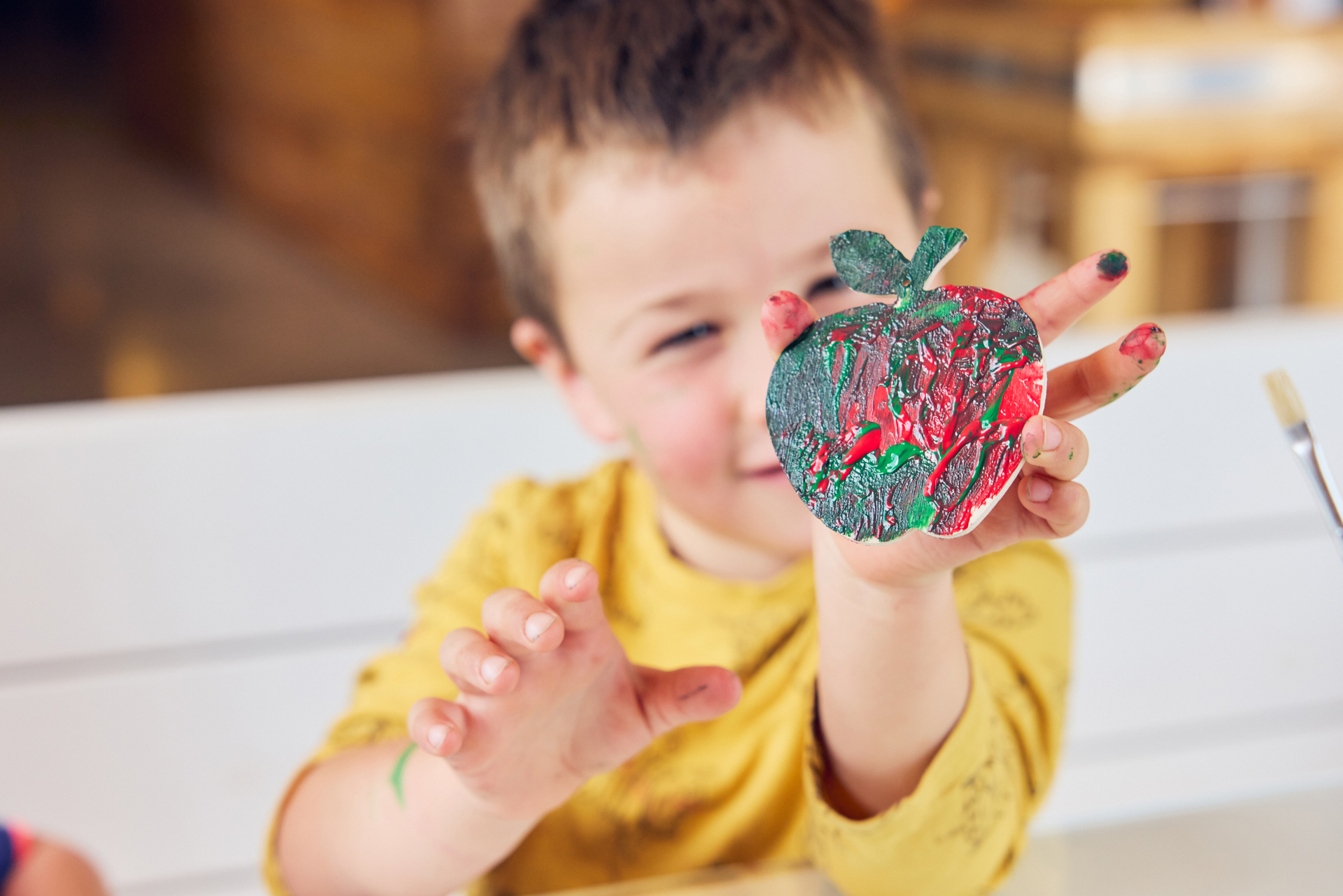 Fun apple painting activity at newton court