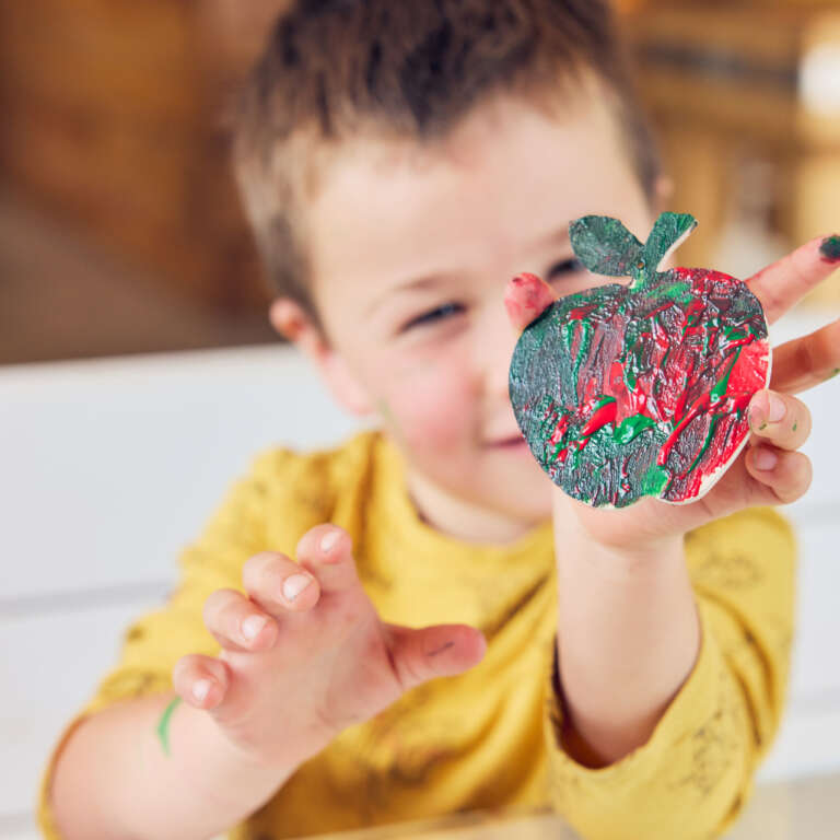 Fun apple painting activity at newton court